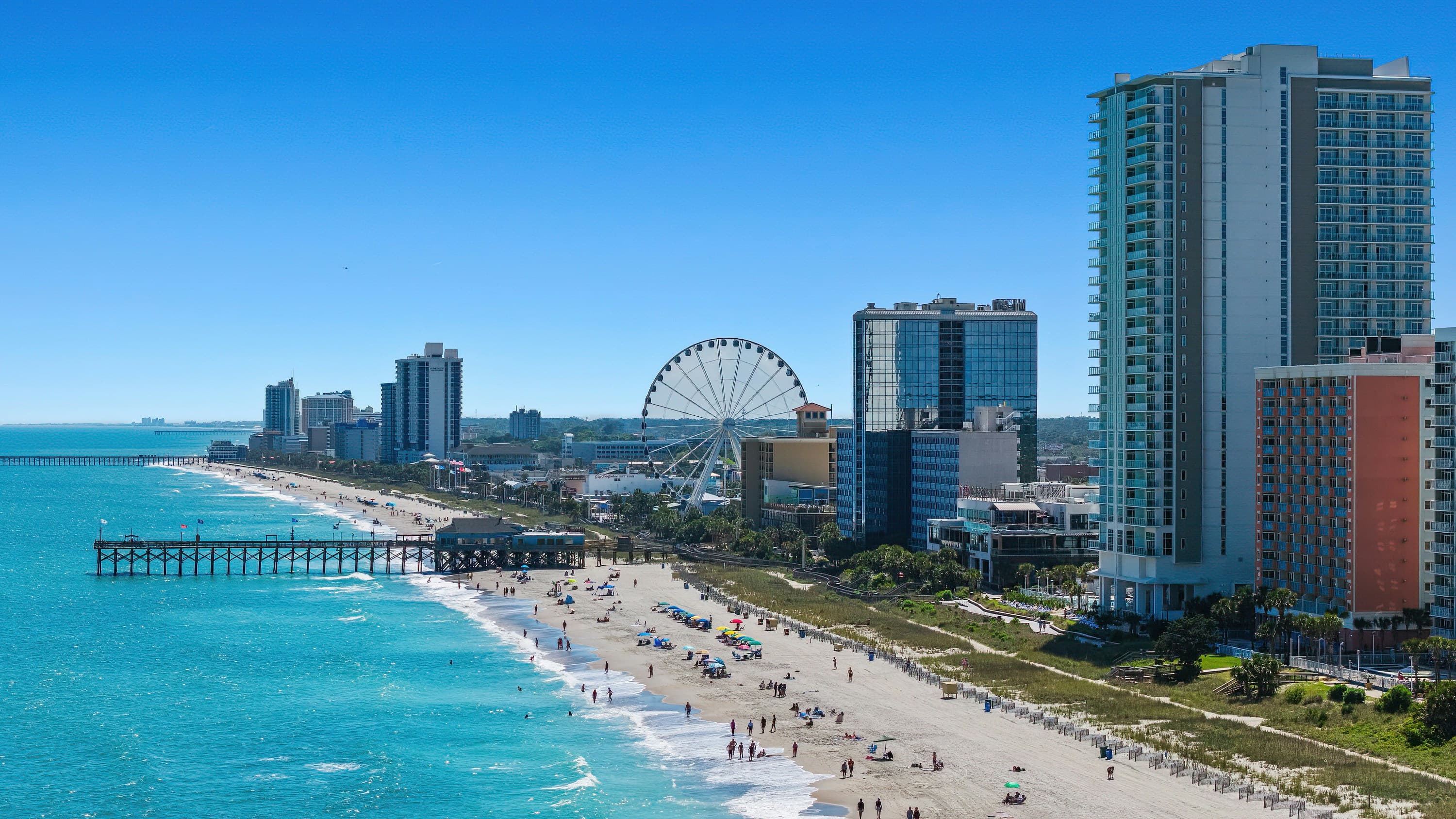 Aerial view of Myrtle Beach coastline with SkyWheel and pier